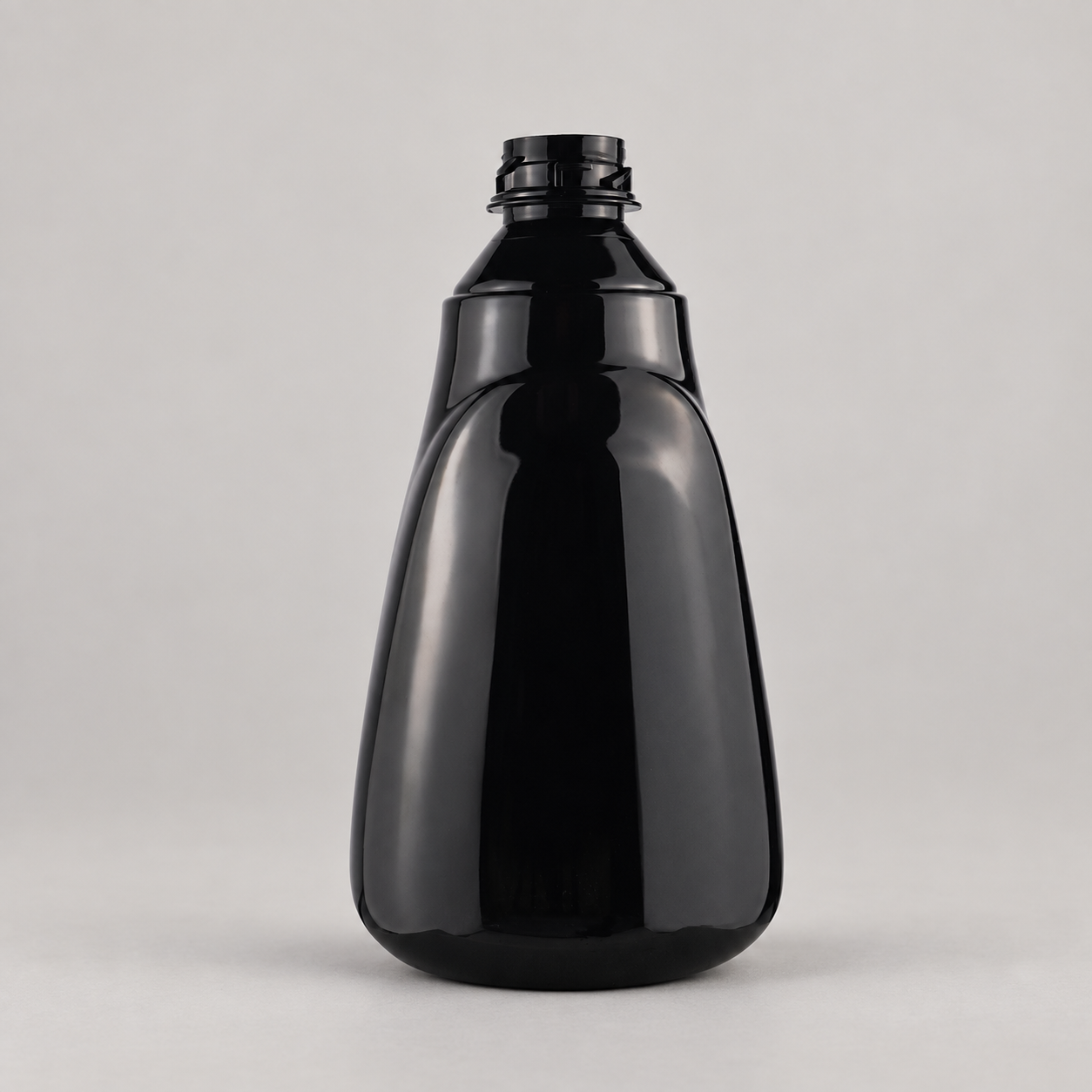 Black bottle with trigger removed for refilling