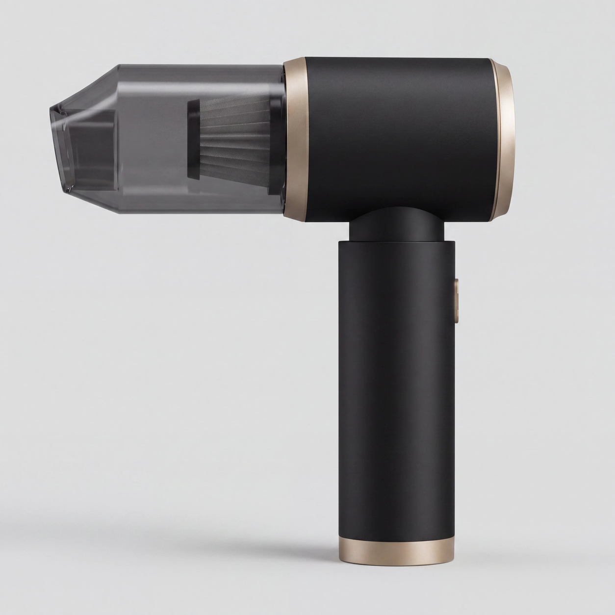 Mini cordless vacuum and blower in matte black with champagne rings and a clear dust canister